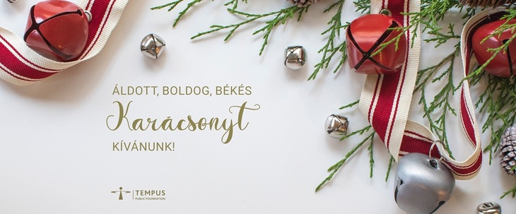 Karácsonyi üdvözlőkártya fenyő és magyal ágakkal és Áldott boldog békés karácsonyt kívánunk felirattal